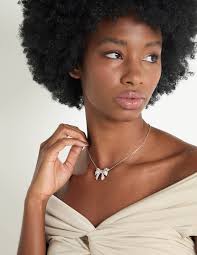 Collar de moño Kendra Scott Krista Gold Bow Short Pendant