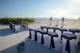 White Columns With Custom Floral Arrangements Navy And Blush Wedding Classic Beauty On Fort Mye Florida Beach Wedding Beach Wedding Packages Fort Myers Beach