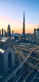 Golden City Excellent Tourist Attractions In Dubai The Burj Khalifa Is The World S Tallest Building With A Dubai City Dubai Buildings Sunset City