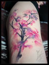 The flowers are all mesmerizing in this tree and it has dripping paint elements. Japanese Cherry Blossom Tattoo On Back By Lou Shaw