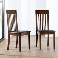 Each chair is upholstered in dark espresso faux leather with accent stitching for an even more gallant decor. Brown Leather Dining Chairs Furniture And Choice