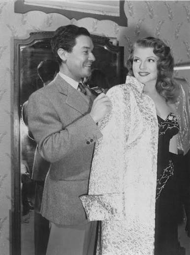 I'm watching "Gilda" (1946) for the 100th time. Jean Louis created such  beautiful gowns for this amazing woman, Rita Hayworth. He accentuated the  character to elevate her Goddess look throughout the movie.