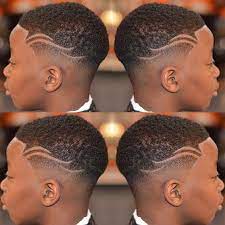 One classic hairstyle for black kids is to keep the top a bit curly and longer and to have a great fade on the side. Black Boy Fade Haircuts With Designs