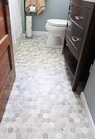 Ceramic bathroom floor tiles are the designer's choice with endless sizes, shapes and colors to complement any scheme. How To Install A Sheet Vinyl Floor Gray Tile Bathroom Floor Grey Bathroom Floor Cheap Flooring