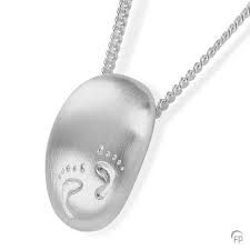 Custom photo engraved jewelry that makes memories last a lifetime. Footsteps Memorial Necklace Urns For Ashes