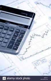 Calculator Laying On Stock Market Market Graph Graphs