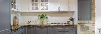 White and a rich, dark gray are my favorite colors to use in a kitchen. Cabinet Painting Refinishing Services Wow 1 Day Painting