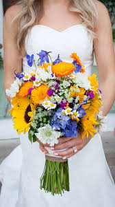 From roses to peonies to succulents, these bouquets feature unique flower combinations in colors that would be perfect for either a spring or a summer wedding! Bright Wedding Bouquet Ideas Sunflower Wedding Bouquet Perfect For Summer Wedding Weddin Sunflower Wedding Bouquet Bright Wedding Bouquet Wildflower Wedding