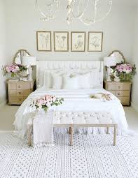 A cute and sweet feminine bedroom with grey walls, a neutral bed with pink ruffled. 19 Feminine Bedrooms With Style