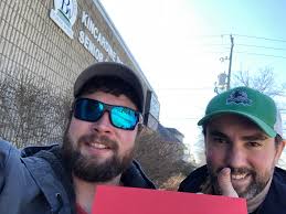 Phil giving the scholarship check from the Riders.