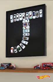Hot wheel room decor with free shipping. Turn Your Kid S Room Into His Favorite Pit Stop With This Framed Hot Wheels Monogram Hot Wheels Bedroom Hot Wheels Room Kid Room Decor