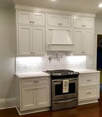 Showplace Cabinetry White Paint With Pewter Glaze Concord Inset Door Style With Five Piece Drawer Heade Kitchen And Bath Design White Kitchen Cabinets Kitchen