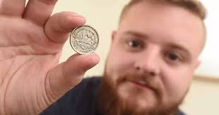 Pub-goer given rare coin worth over £100 in his change after buying a pint 