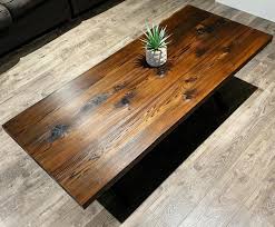 The innovative coffee table is made from composite wood with a rich finish to complement any decor. Shou Sugi Ban Coffee Table Spiers Innovative Woodworks Facebook