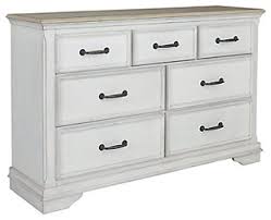 Bedroom furniture at cottage & bungalow, you'll discover a wide array of heirloom quality coastal bedroom furniture and beach furniture including beds, chests and dressers that incorporate classic beach house themes like crisp white finishes, nautical design elements, and even eclectic and whimsical styles. Bedroom Coastal Furniture Decor Ashley Furniture Homestore