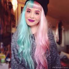 Pin By Ceren Oguz On Melanie Martinez Split Dyed Hair Hair Color Pastel Half And Half Hair
