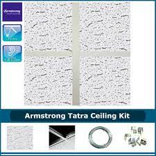 How to choose and install a suspended ceiling including a guide to fitting ceiling tiles. Armstrong Tatra Suspended Ceiling Kit With Grid