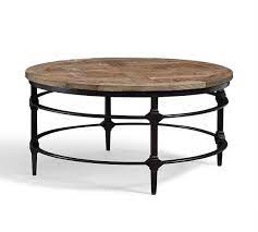 Wood finishes and rustic metal finishes. Parquet 36 Round Reclaimed Wood Coffee Table Pottery Barn