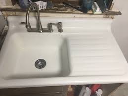 single basin porcelain cast sink drainboard