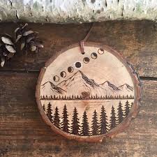 Wood Burned Mountain Scene With 7 Phases Of Total Eclipse Etsy Wood Burning Art Wood Burning Crafts Wood Burning Patterns