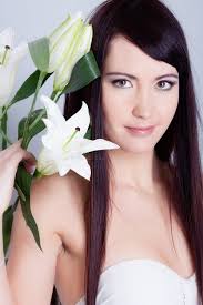 Girl with Lily Flower in Hand Stock Image