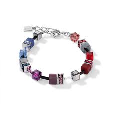 Cet aci créé en 2000 est actuellement Armband Coeur De Lion Multicolor Dunkel Wurfel Design Kontraste Dresden