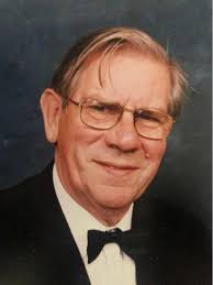 A new try . My father in law Gordon Dunning had these pictures, he's 97.  The Pictures show Bill Dunning, his father. It's difficult to see, but he's  standing in the door.