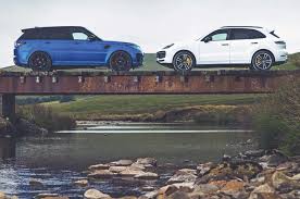 Hot Suv Twin Test Porsche Cayenne Turbo Vs Range Rover Sport Svr Autocar