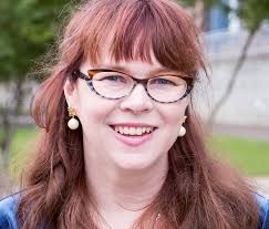 Margo Bergman, Ph.D. receives the Distinguished Community Engagement Award  in Institutional & Systems Analytics at UW Tacoma