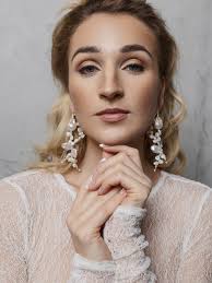 Puošnūs perlų auskarai