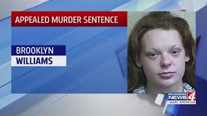 Woman's conviction upheld in Oklahoma officer's slaying