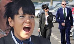 Lily Allen wears a masculine suit as she attends Cheltenham races with her  husband