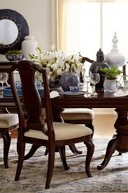 A used classic,tuscany inspired, two toned black and warm cherry dining table set. The Havertys Orleans Dining Table Is An Elegant Pedestal Table With Cabriole Legs Inspired By Louis Elegant Dinning Room Dinning Room Chairs Dining Room Table