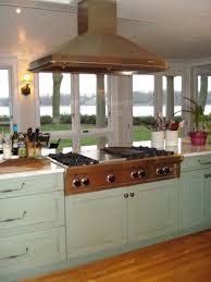 The island was then rebuilt to incorporate a 36 cooktop with a sleek vent hood overhead. Pin By Lane Campbell On Remodel Ideas Kitchen Island Range Kitchen Island Range Hood Island With Stove