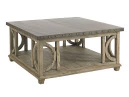 Lower shelf is covered in tightly woven rattan peel. Wyatt Cocktail Table Lexington Home Brands