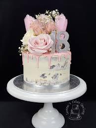 18th Birthday Cake Design Rose Gold Pretty In Pink White And Silver For An 18th Birthday This Is Caramel Mud Cake With White Chocolate Birthday Cake With Flowers 18th Cake White Birthday Cakes