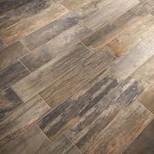 What Are Different Specifications Of Hardwood Tile Hardwood Tile This Wood Look Porcelain Tile Flooring A New Alternati Flooring Wood Look Tile House Flooring