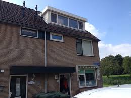 Dakkapel Met Keralit En Aanpassing Rolluik Deze Is Volledig Weggewerkt Achter Het Boeideel Dakkapellen Huis Zolder