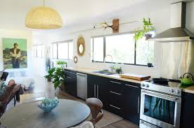 The sweet chocolate brown of the modern kitchen cabinets makes a stark contrast to the slick frosting texture of the marble countertops and backsplash. 16 Best One Wall Kitchens How To Arrange A Kitchen Along One Wall Apartment Therapy