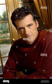 Bruce Thomas (pictured) plays an ex-beau determined to win back his girl  after Santa delivers her "A Boyfriend for Christmas.” Kelli Williams stars  as Stock Photo