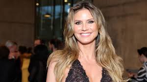 Heidi Klum stuns in black triangle bikini during relaxing poolside moment