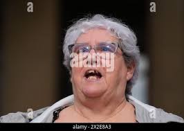 Margaret McKeich, the mother of of 14-year-old Caroline Glachan, outside  the High Court in