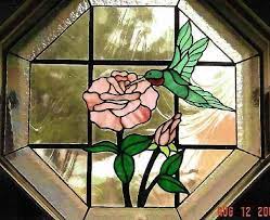 Today, stained glass windows come in a huge array of different shapes, sizes and designs and price points to fit nearly any budget. Hand Crafted Hummingbird And Rose Octagon Insert By Glass By Knight Stained Glass Art Studio Custommade Com