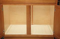 This under sink mat is the best i've seen and works great. Mat For Sink Cabinet