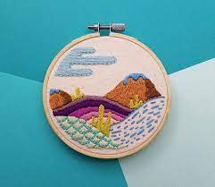 Check spelling or type a new query. Hand Stitched Embroidery Of A Fantastical Landscape Of Rolling Hills Mountains And Plant Lif Art De Cerceau De Broderie Points De Broderie A La Main Broderie