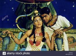 Asterix and obelix do their best to keep him alive. Asterix Obelix Mission Kleopatra Asterix Obelix Mission Kleopatra Kleopatra Monica Bellucci Numerobis Jamel Stockfotografie Alamy