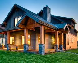 Vertical siding installation is on trend for a reason—blended with horizontal siding or other materials, it's an ideal way to add dimension and visual interest to the home exterior, particularly • complement the home style: Covered Living House In The Woods Contemporary House Exterior Modern Exterior