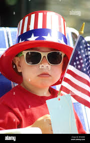4th of july parade flag hi-res stock photography and images
