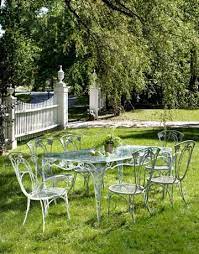We particularly love antique wrought and cast iron french cafe chairs, elegant wirework, old german bierkeller slatted table and chair sets, vintage shabby aluminium and timeless oak garden sets. Wrought Iron Outdoor Furniture Vintage Iron Patio Furniture
