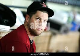 JULY 08 2012: Houston Astros manager Brad Mills #2 speaks with his team in  the dugout during the MLB baseball game between the Houston Astros and the  Milwaukee Brewers from Minute Maid